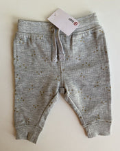 Load image into Gallery viewer, Target baby girl size 0-3 months grey drawstring track pants gold pattern, BNWT
