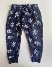 Load image into Gallery viewer, Cotton On Kids size 5 navy blue dinosaur space rockets track pants, VGUC
