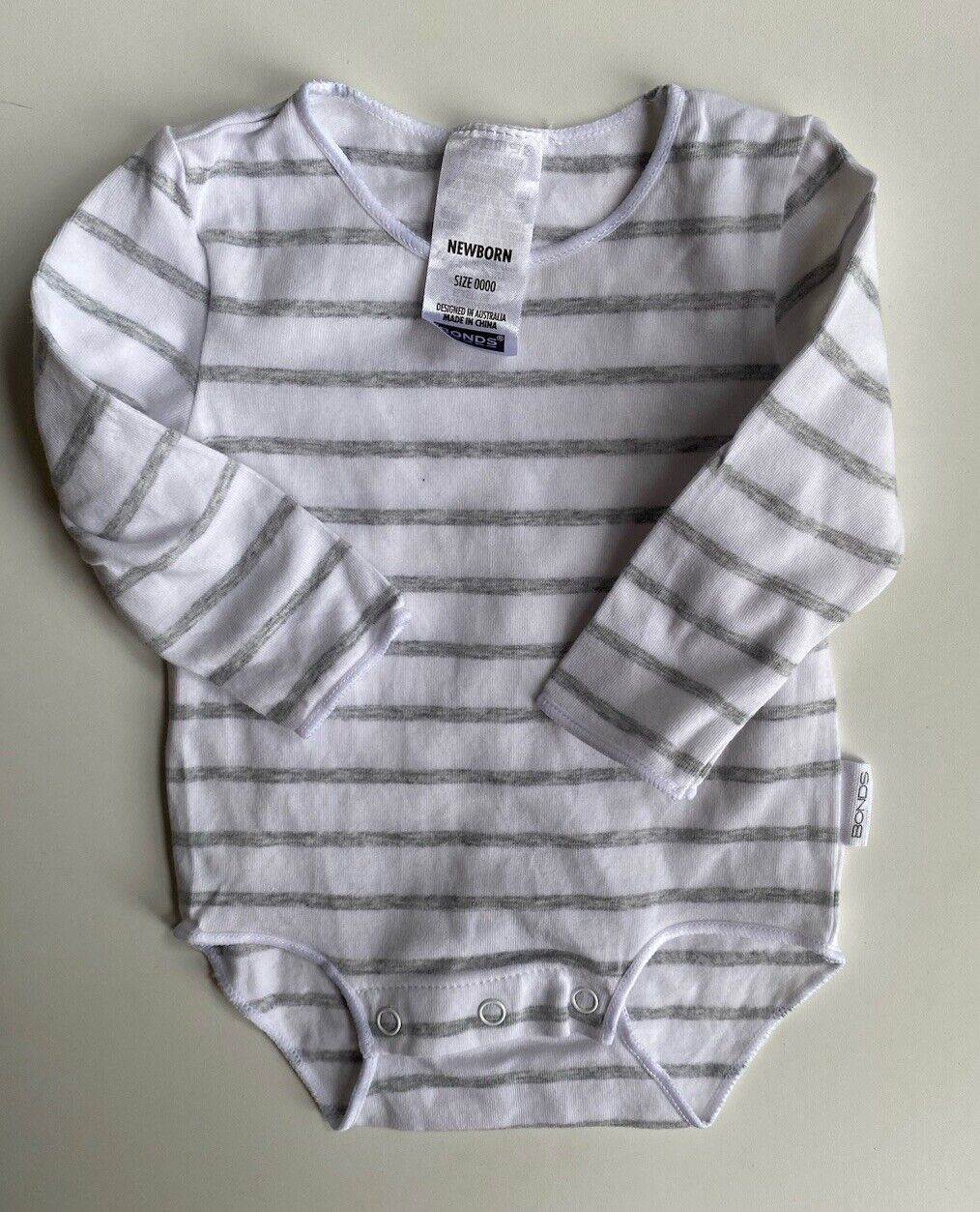 Bonds baby size newborn grey white stripe bodysuit top, VGUC