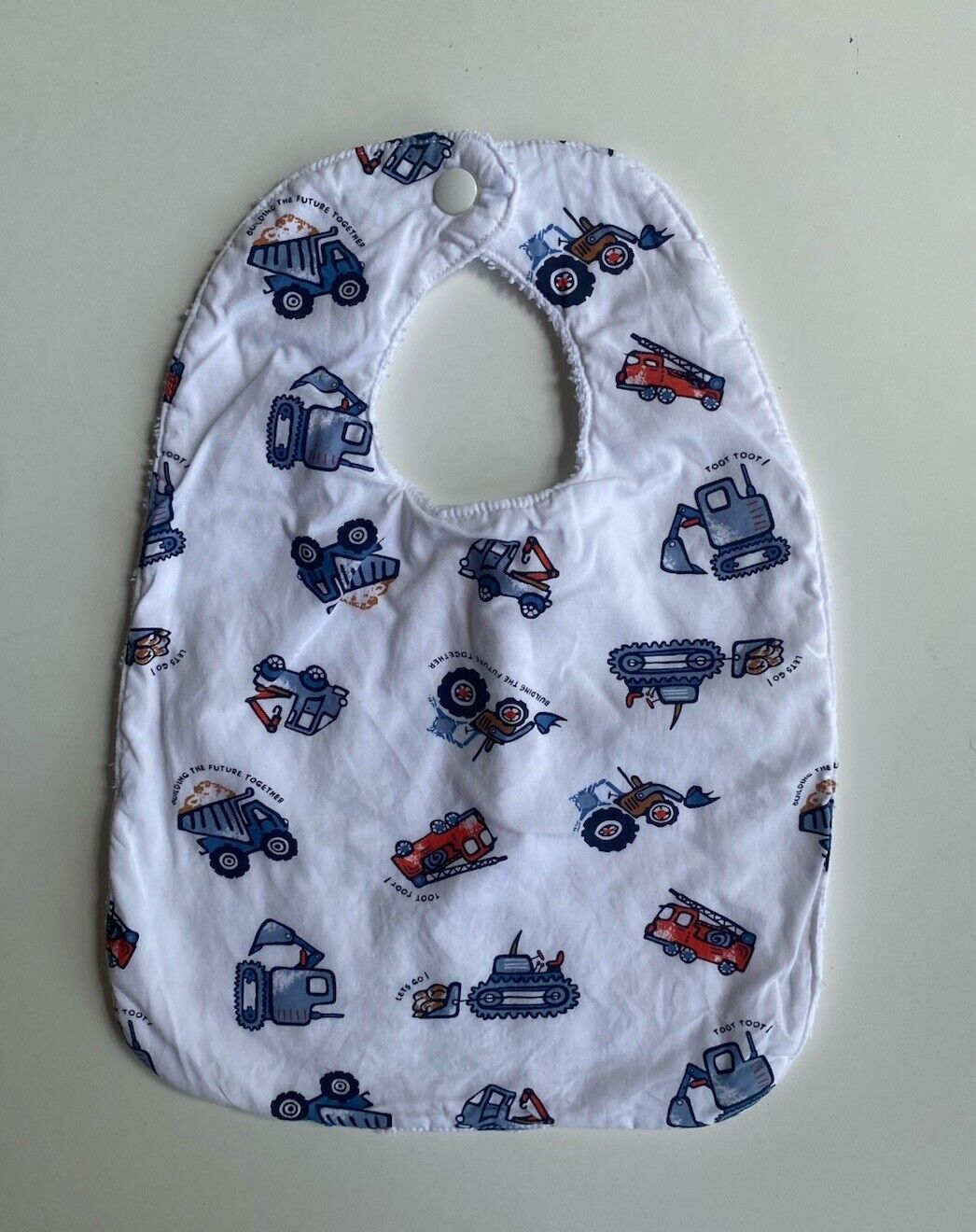 Unbranded baby bib white trucks diggers, VGUC