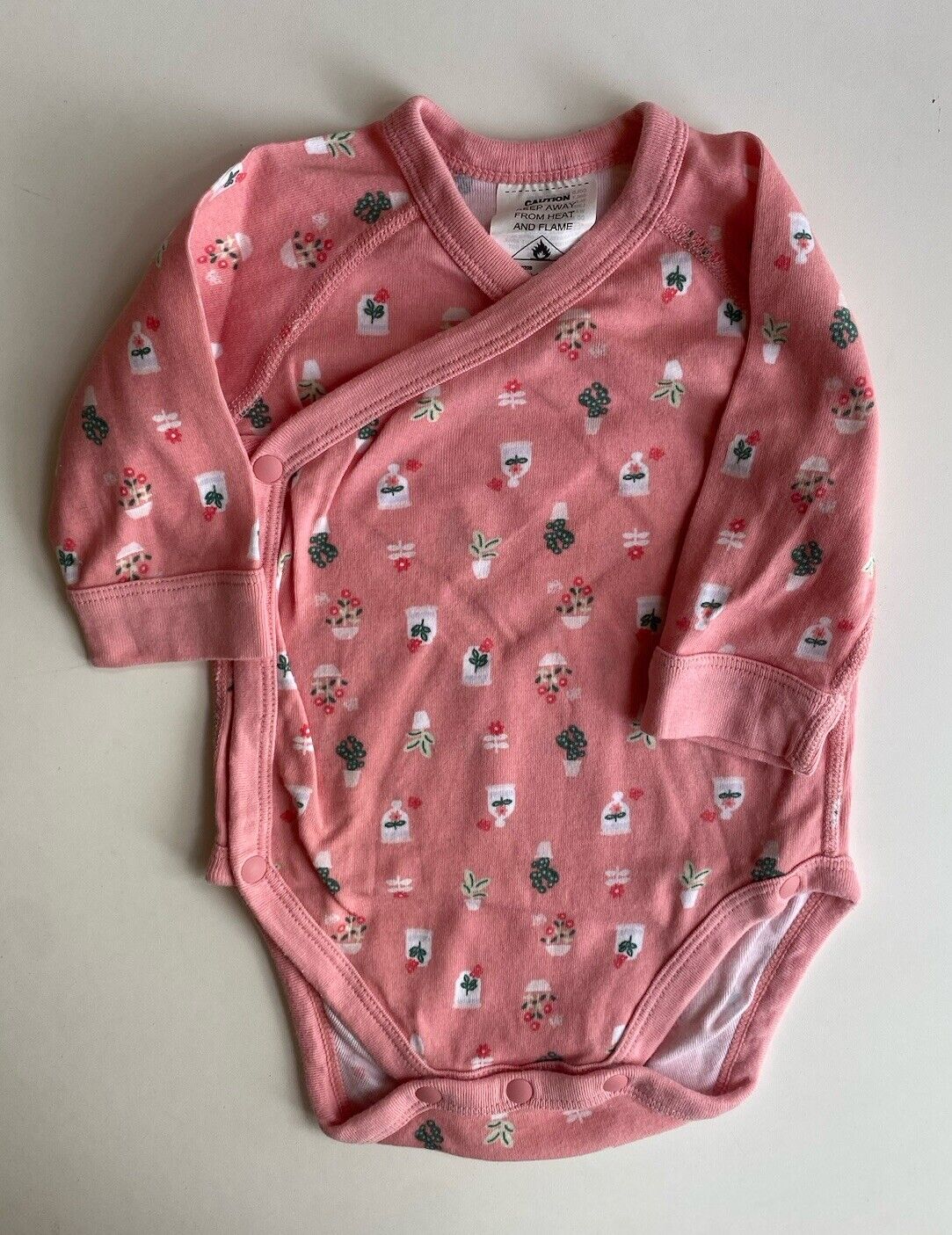 Uniqlo baby girl size 0-3 months pink floral wrap long sleeve bodysuit