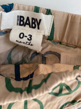 Load image into Gallery viewer, Cotton On baby size 0-3 months beige elastic waist shorts green Peace sign, VGUC
