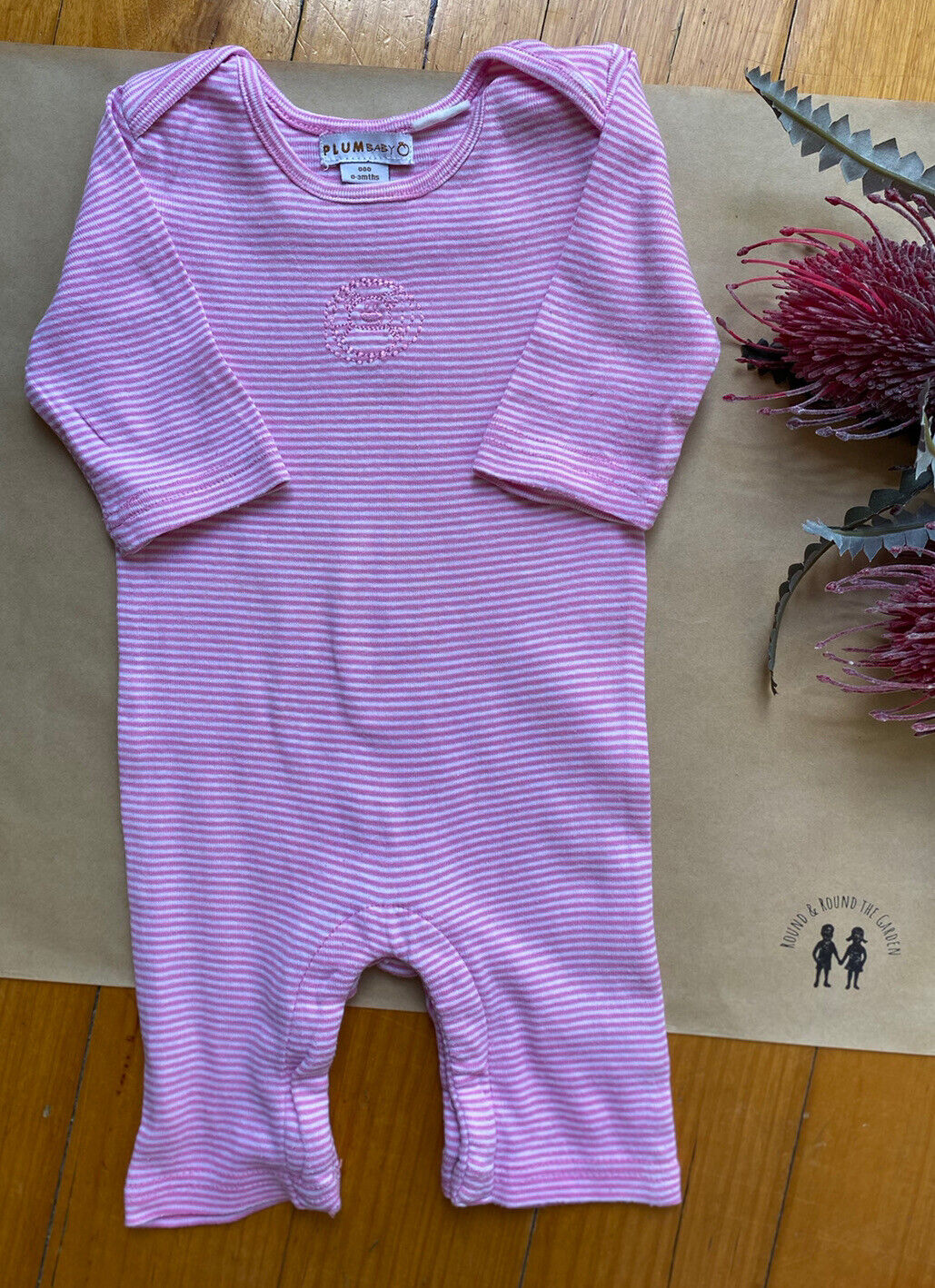 Plum Baby girl size 000 pink striped one-piece with bear, VGUC